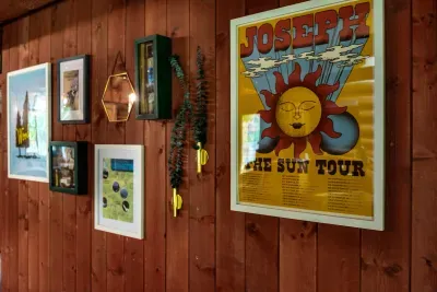 Warm wood walls and stylish artwork bring it all together. :)