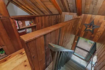 Reading nook and stairs with handrail to the main level