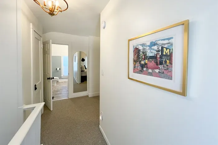 Two additional bedrooms upstairs with another full bath