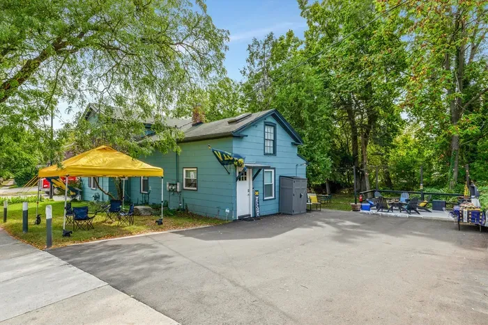 Our large driveway has room for 4 cars, or two big SUVs. or you can use it for your tailgate enjoyment. Our tent is available for some added shade. Be sure to use some weights located in the shed