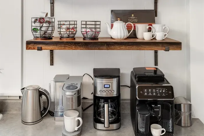 We have an assortment of hot beverages. Our Latte Go machine can make your favorite coffee drink. We provide beans, ground coffee as well as K cups and creamer in our Mega COFFEE BAR!