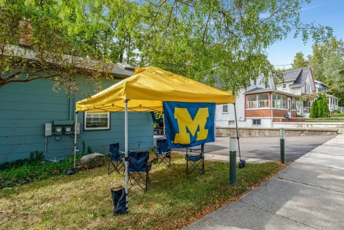 Our pop up canopy is available for your use. Be sure to use the weighted bags to keep it secure