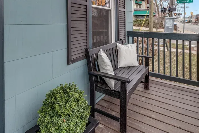 Our Front Porch has a bench and two rocking chairs