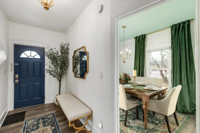 Large Front Entryway with bench and mirror.