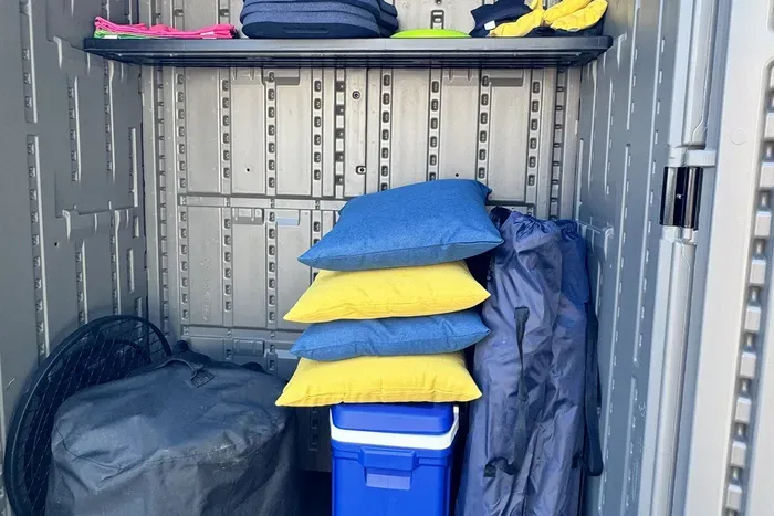 Outdoor shed contains tailgate necessities
