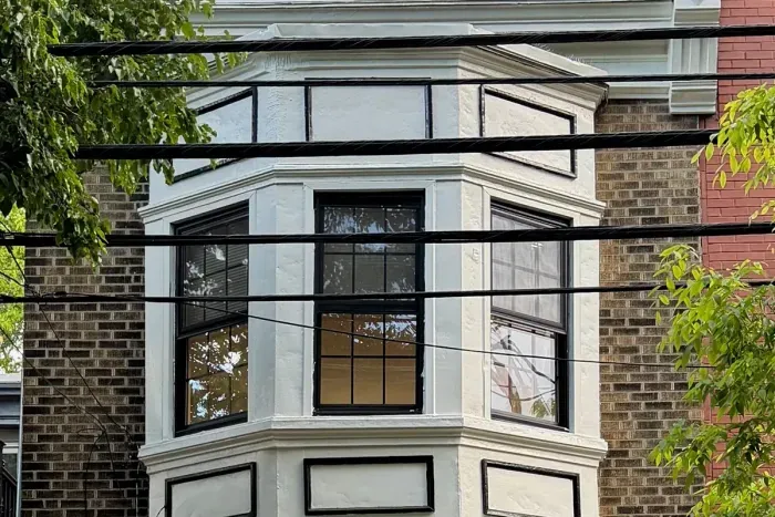 Neoclassical victorian Rowhouse on a treelined street. fully remodeled inside