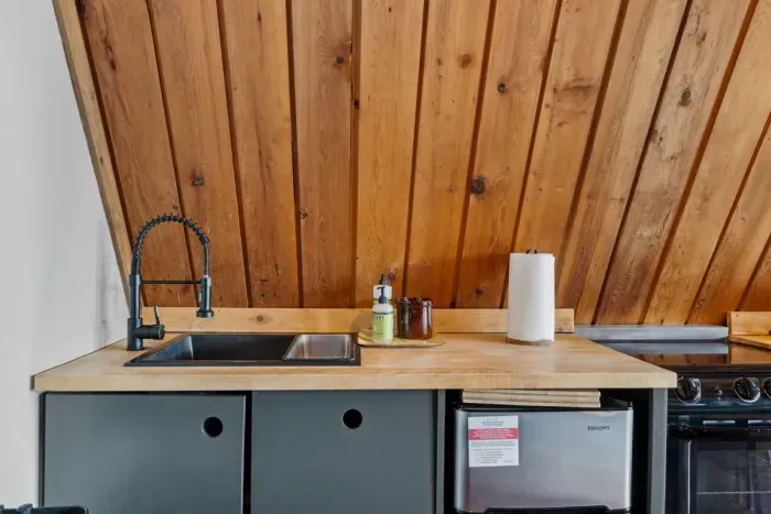 Our kitchen is tiny but has everything you need to prepare a meal