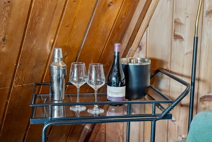Settle into slow moments with a glass in hand and nature all around.