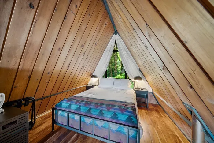 Enjoy the quiet luxury of a peaceful bedroom retreat—plush bedding, soft lighting, and thoughtful design throughout.