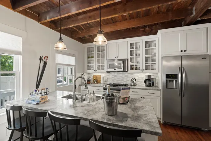 Cook in style in this fully equipped Chef's kitchen, where modern appliances meet historic charm.