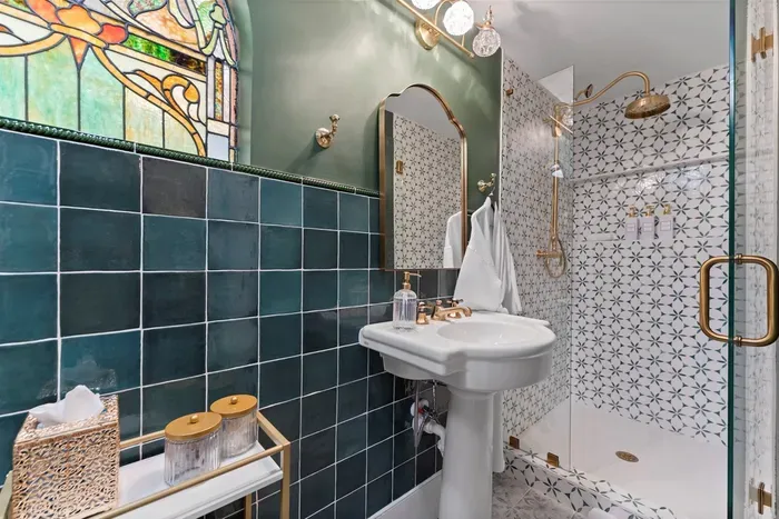 Our clean and modern bathroom features soft towels, essential toiletries, and thoughtful touches to make your stay effortless.