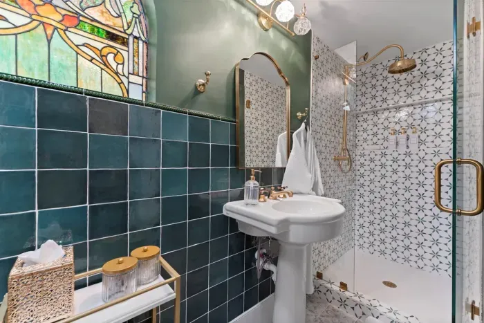 Our clean and modern bathroom features soft towels, essential toiletries, and thoughtful touches to make your stay effortless.