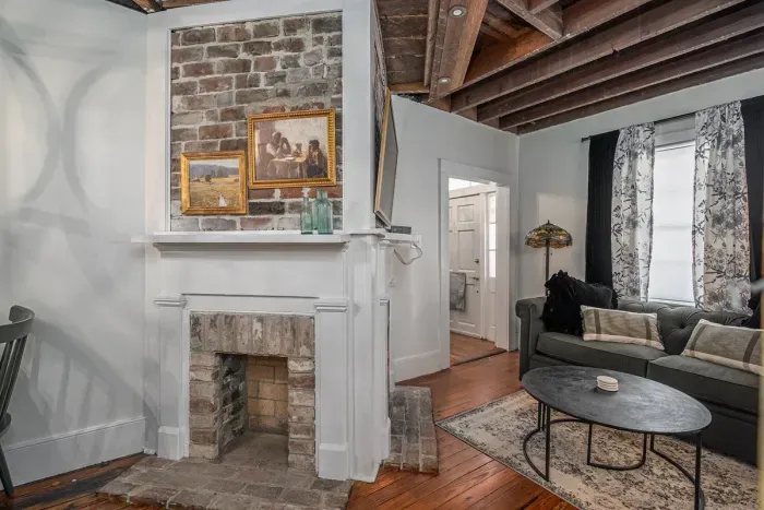 Unwind in the heart of history—our cozy living room blends classic charm with modern comfort