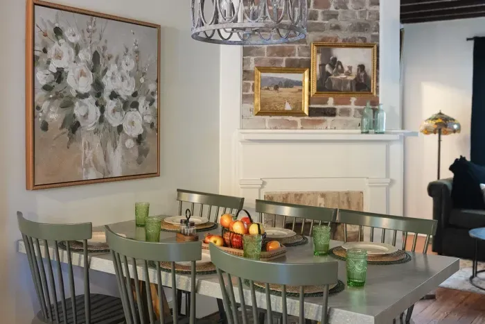 Gather around the  dining table and enjoy meals in a space steeped in history.