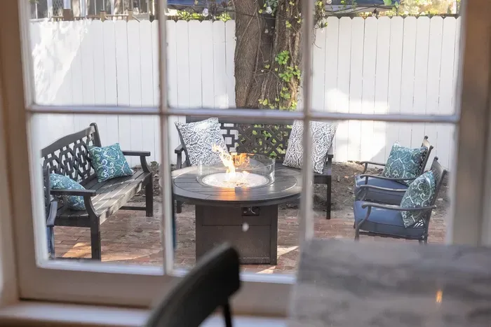 Unwind in the shared courtyard, a perfect spot for morning coffee or evening chats.