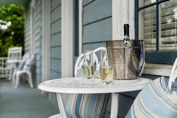 Step out onto the shared balcony—an ideal spot to relax, sip sweet tea, and enjoy the neighborhood's historic feel.
