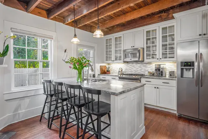 Cook in style in this fully equipped kitchen, where modern appliances meet historic charm.