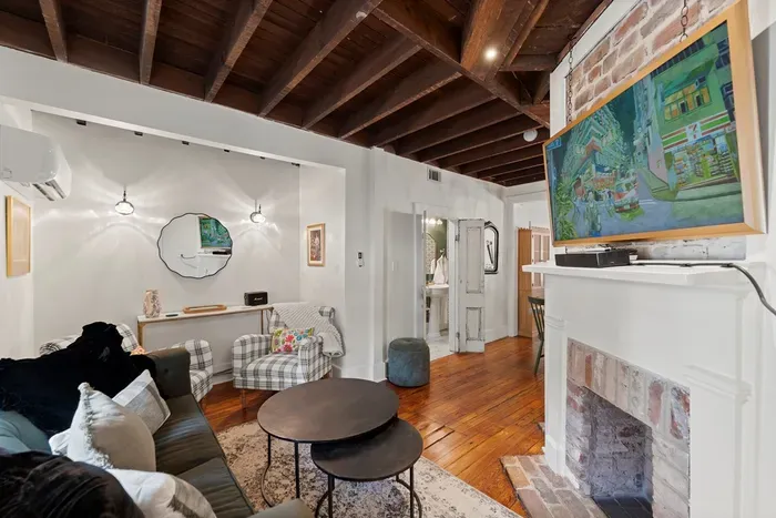 Our inviting living room offers a cozy place to relax, with plush seating and curated touches that make it feel like home.