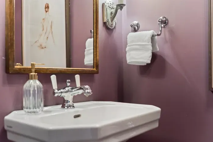 Our clean and modern bathroom features soft towels, essential toiletries, and thoughtful touches to make your stay effortless.