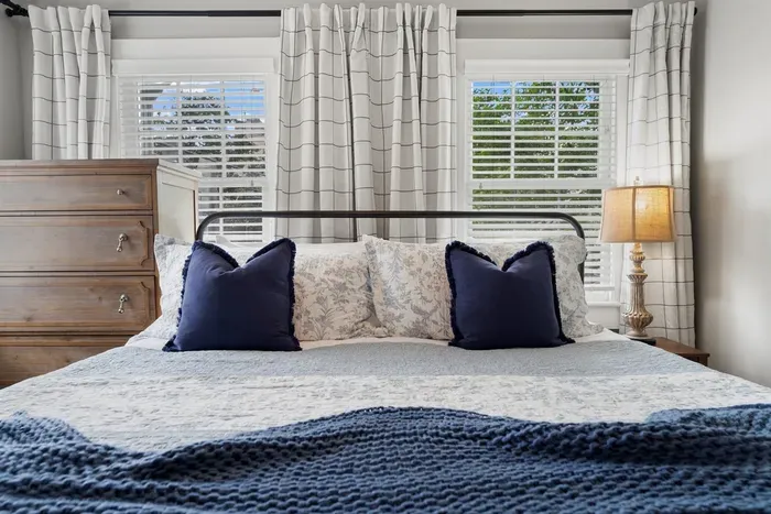 Sink into our plush king bed and let the day melt away—comfort meets quiet in this private escape.