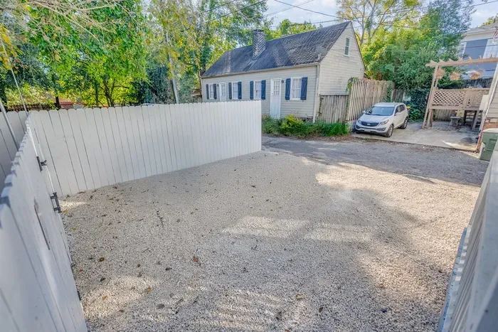 Off street Parking is just off the back porch entrance and each of our two townhouse units has one assigned space.