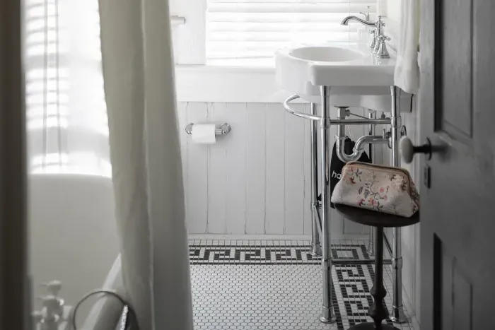 On the second floor, sink in to our restored claw foot tub. No need to pack the basics, paper,  toiletries, and linens provided.
