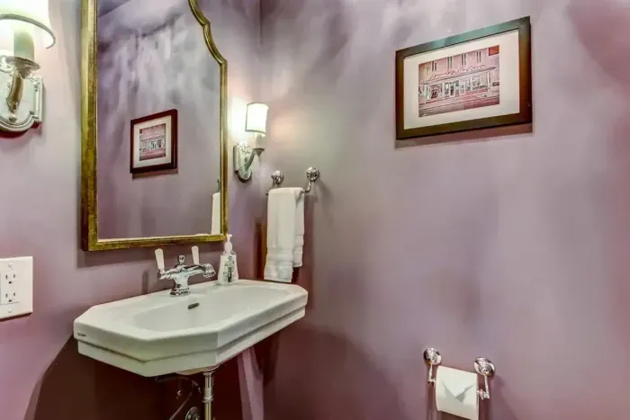 Charming half bath conveniently located on the first floor