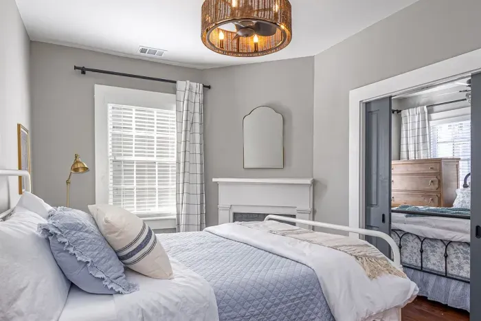 The second bedroom can be opened to adjoin the first bedroom for families wanting to be closer together. Or they can remain separate by closing the pocket doors.