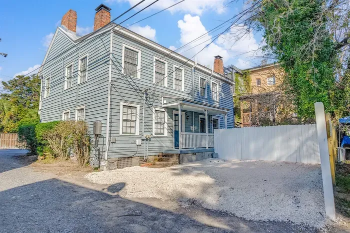 Off street Parking is just off the back porch entrance and each of our two townhouse units has one assigned space.
