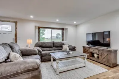 Upstairs living room: Roku Smart TV for streaming, no cable or satellite. DVD player and DVDs are available in the drawer of the TV stand. Bluetooth speakers are located in the TV stand. Don't forget to sign our guest book!