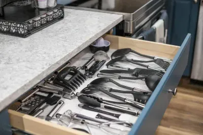 Fully stocked kitchen cooking utensils. Oven mitts and pot holders. Home Hero Kitchen 44-piece cooking non-toxic utensils provided for your use.