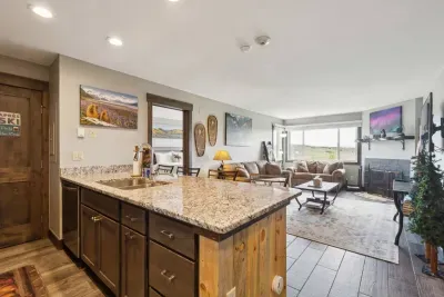 Whip up breakfast with a view or pour a glass of wine while dinner simmers—this open-concept kitchen makes it easy to stay connected, cozy, and well-fed.