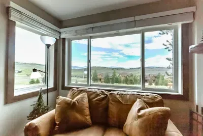 Big windows. Soft seating. Even better views.
Whether you're sipping cocoa or reading a book, this corner is designed for slowing down and soaking in the stillness of Granby.