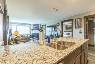 The heart of the home, with mountain views in sight while you prep dinner or pour a glass of wine. Whether you're cooking or catching up with family, this open-concept space keeps you connected to it all.