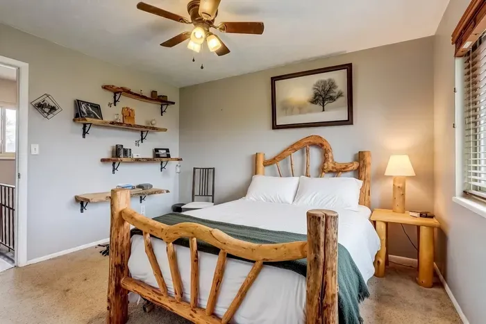Upstairs adventure bedroom: Queen Bed. Hangers and luggage rack. Fun adventure decor and Ella's (owner's dog) story.