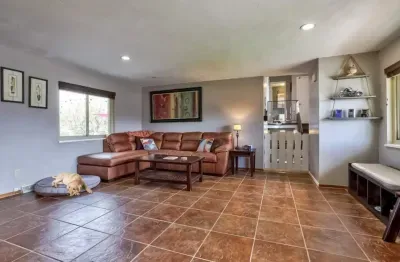 Doggie/baby gate. Throw blankets. Throw pillows. Smart TV for streaming, no cable or satellite. Games and kids toys are available in the basket of the TV stand. Don't forget to sign our guest book!