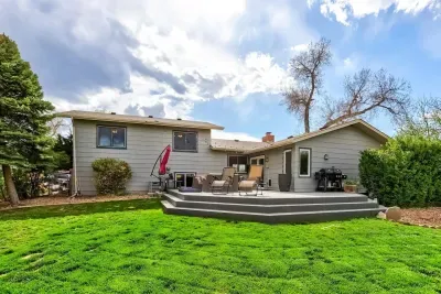 Fully fenced-in, private backyard: A patio table that seats six people. Additional outside chairs, propane Grill/smoker and grilling utensils. Propane firepit sitting under twinkling lights when the sun goes down.