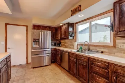 Modern amenities meet rustic charm! 🍴 Fully stocked kitchen ready for your culinary creations. #CookInComfort #VacationVibes