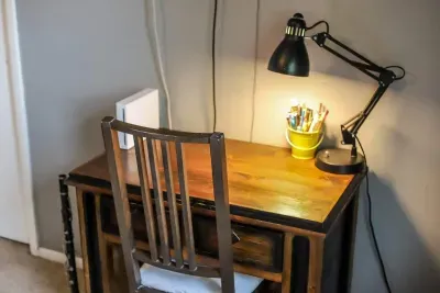 A writer's nook or a gamer's retreat? This charming desk setup is perfect for brainstorming your next novel or challenging your high score! ✍️🎮