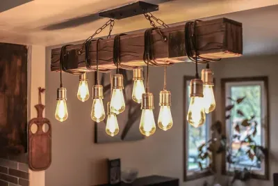 Rustic charm meets modern glow ✨ This handcrafted light fixture sets the perfect vibe for cozy evenings and memorable meals. #StayInspired