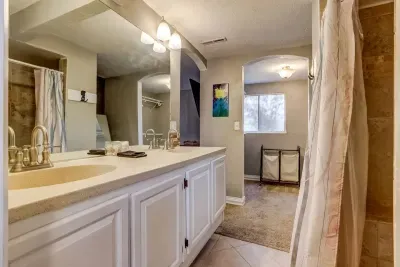 Double sinks = no fighting over counter space! ✨ Get ready in style with plenty of room, a walk-in closet, and a refreshing shower just steps away.