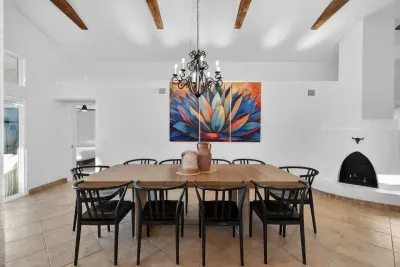 Dining area with seating for 10 at the table and an additional 5 at the countertop