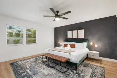 The spacious king bedroom features a plush king-sized bed, ample closet space, and a private bathroom for your comfort and privacy