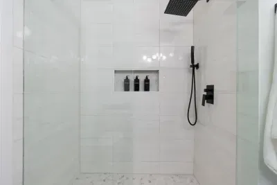 Walk in shower with premium shampoo, conditioner and body wash. 