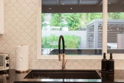 Experience the epitome of modern living with our beautifully designed kitchen, featuring top-of-the-line appliances and stylish finishes.