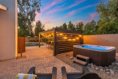 Outdoor Oasis: Relax in the hot tub under twinkling lights and soak in the Scottsdale vibes!