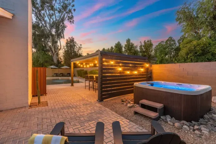 Outdoor Oasis: Relax in the hot tub under twinkling lights and soak in the Scottsdale vibes!