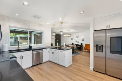 Stay cool and hydrated with our fridge featuring a water and ice dispenser, plus a portable ice maker for endless ice-cold drinks.