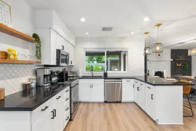 Enjoy the convenience of a home-style kitchen, featuring everything you need to whip up delicious meals: dishes, utensils, cookware, a toaster, toaster oven, and slow cooker.
