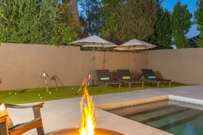 Enjoy the private backyard and pool area.